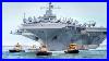 Us-Massive-100-000-Ton-Aircraft-Carrier-Moved-By-Tiny-Tugboats-From-Port-To-Sea-01-rj
